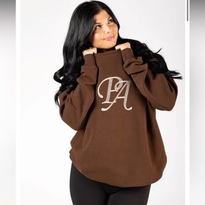 Ptula. The script crewneck. Brown. Medium. New. Never worn